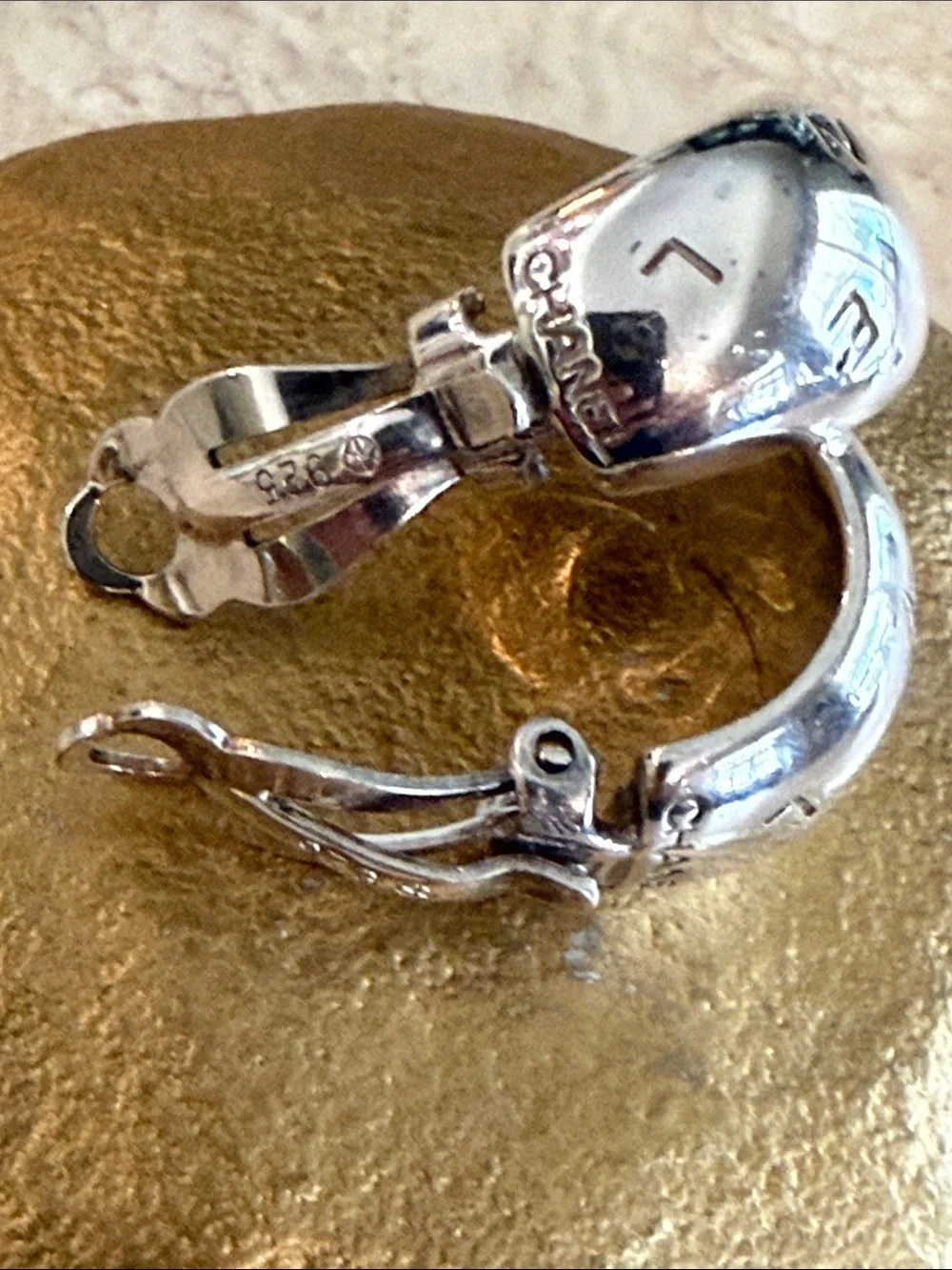 CHANEL Sterling Silver Logo Clip Hoop Earrings